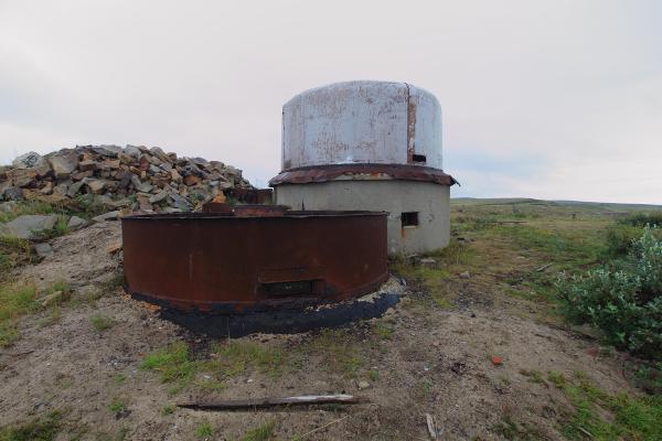 The armored bunker and radome for abandoned post-ww2 ground defence battery command post. Surface part of a large underground facility.
